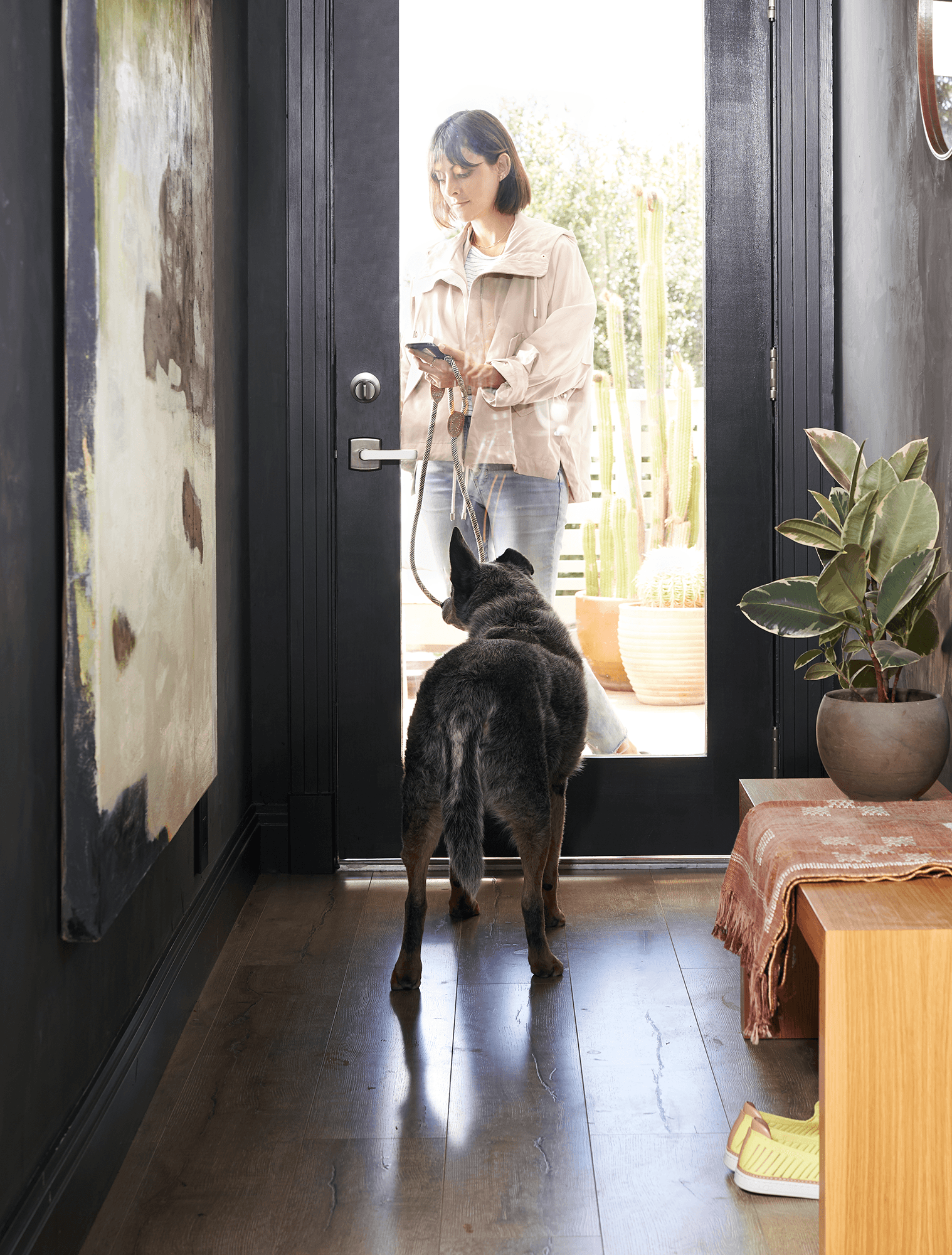 A person accessing their home using Level lock